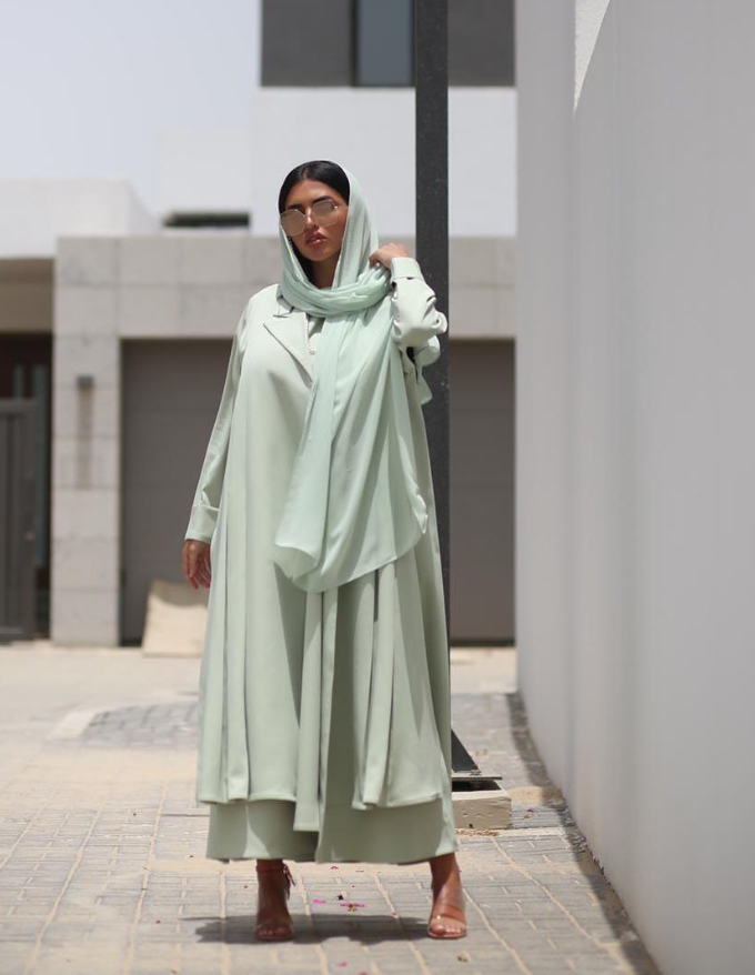 Beautiful Platinum Blazer with a Sleeveless dress underneath